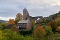 German bertrada castle in the Eifel with shining autumn leaves