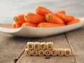 German Beta carotene on wooden dices