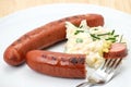 German Bratwurst sausage with coleslaw Royalty Free Stock Photo