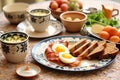 german breakfast with cold cuts, hard-boiled eggs, and whole grain bread Royalty Free Stock Photo