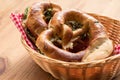 German Brezel pretzel with chives and butter in breadbasket Royalty Free Stock Photo