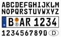 German car plate with symbols, numbers and letters Royalty Free Stock Photo