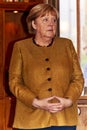 German Chancellor Angela Merkel looks a bit thoughtful to the side