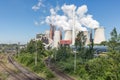 German Coal-fired power plant with railroad tracks near Garzweiler mine Royalty Free Stock Photo