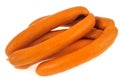 Strings of Frankfurter sausages on a white background