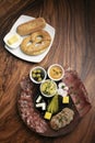 German cold cuts tapas snack platter with meats and bread