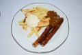 Currywurst with fries and whip cream