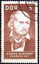 GERMAN DEMOCRATIC REPUBLIC - CIRCA 1967: A stamp printed in Germany shows poet Georg Herwegh 1817, circa 1967. Royalty Free Stock Photo