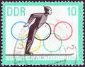 GERMAN DEMOCRATIC REPUBLIC - CIRCA 1963: A stamp printed in Germany shows Ski jumper taking off, circa 1963.