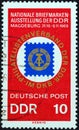 GERMAN DEMOCRATIC REPUBLIC - CIRCA 1969: A stamp printed in Germany shows badge of DDR philatelists` association, circa 1969.