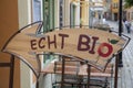 German directional sign translates into Real Organic in English