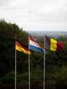 German dutch and belgian flags at triple border point Drielandenpunt Les Trois Bornes Dreilandereck, Vaalserberg Europe Royalty Free Stock Photo