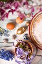 German Easter cake, eggs, flowers, ribbons on the table closeup Royalty Free Stock Photo