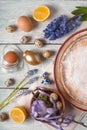 German Easter cake, eggs, flowers, ribbons on the table top view Royalty Free Stock Photo