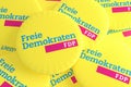 German Election Politics Badges Concept: Pile of FDP Buttons, 3d illustration