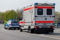 German emergency ambulance and police vehicle stands on the street