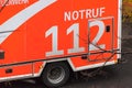 German emergency call number on an ambulance car Royalty Free Stock Photo