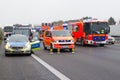 German emergency service cars stands on freeway