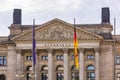 The German and EU flags in front of the distinctive Bundesrat building in Berlin, Germany