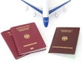 German family passports with plane isolated white background Royalty Free Stock Photo