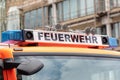 German Fire Truck with Feuerwehr Sign and Emergency Lights: First Responder and Public Safety Equipment