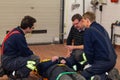 German firefighter team in an exercise with a injured in a stretcher