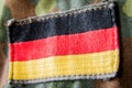 German flag appliquÃÂ©d on military jacket