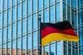 German flag on the background of office building, Atlanta, USA Royalty Free Stock Photo