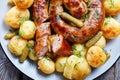 German food: new potato served with round sausage