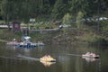 German and foreigner travelers people playing and paddle boat in lake