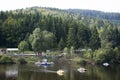 German and foreigner travelers people playing and paddle boat in lake