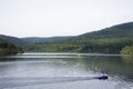 German and foreigner travelers people playing and paddle boat in lake