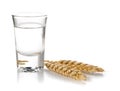 German hard liquor Korn Schnapps in shot glass with wheat ears Royalty Free Stock Photo