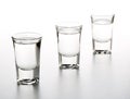 German hard liquor Korn Schnapps in shot glasses Royalty Free Stock Photo