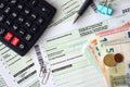 German income tax return form with pen and european euro money bills lies on accountant table close up. Taxpayers in Germany using