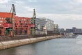 German inner harbour with port cranes in Duisburg