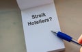 German language question STREIK HOTELIERS? English = Strike hoteliers. Hotel owner hotel following the announced restrictions.
