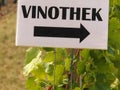 German language with wine store direction sign in a vineyard