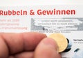 German lottery ticket scratching Royalty Free Stock Photo