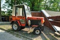 German-made compact utility tractor Agria 590. Heavily used, parked on a yard.