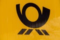 German mail service Deutsche Post logo on a yellow container