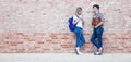 German male and female students in discussion Royalty Free Stock Photo