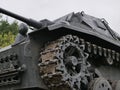 German medium tank of the Second World war in working order. the tank is painted black against a background of green trees in summ Royalty Free Stock Photo