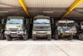 German military trucks stands under military roof