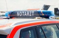 German Notarzt, emergency doctor car drives on airport