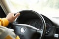 German old man driving car very fast on highway of Stuttgart