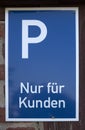 A German parking sign nur fÃÂ¼r Kunden which translates into Customer parking only in English language Royalty Free Stock Photo