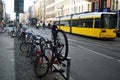 German people biking bicycle and lock bike at bicycle parking beside road for go to passenger tramway networks