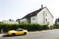 German people stopping yellow sport car at beside road on Ilvesheimer road