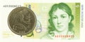 50 german pfennig coin agains 5 german mark bank note Royalty Free Stock Photo